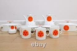 A Vintage mid-century dinner/coffee set by Thomas Germany Pinwheel Orange
