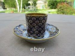 BERNARDAUD & Co LIMOGES BLUE AND GOLD ENCRUSTED DEMITASSE COFFEE CUP AND SAUCER