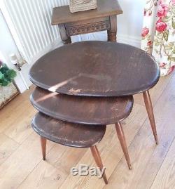 Original dark colour vintage Ercol Pebble nest 3 set Coffee Tables. Used