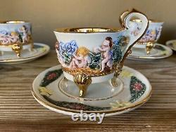 Set of eight vintage R. Capodimonte cups & saucers. Gold interior