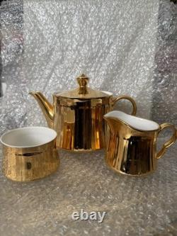 Vintage Royal Worcester Tea/Coffee Set With A Reflective Gold Lustre Finish
