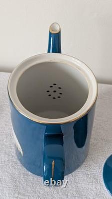 Vintage tea or coffee set in teal blue with cranes design Made in China