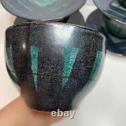 Ensemble de 4 tasses et soucoupes en poterie ANTA verte à motif tartan en bon état