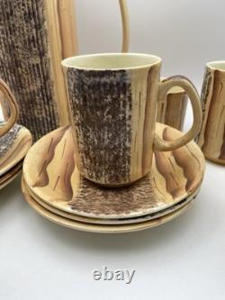 Ensemble de café Phoenician Price & Kensington des années 1970. Effet bois strié en très bon état.