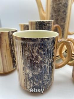 Ensemble de café Phoenician Price & Kensington des années 1970. Effet bois strié en très bon état.