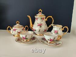 Ensemble de café en porcelaine Bareuther Bavaria décoré de roses roses vintage et d'or, en très bon état.