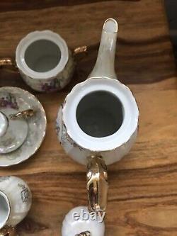 Ensemble de café en porcelaine du Japon avec lustre nacré et motif de Fragonard amoureux de style vintage