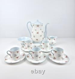 Ensemble de café en porcelaine fine Shelley vintage de 13 pièces à motif floral chintz fabriqué en Angleterre en très bon état.