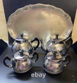 Ensemble de café/thé vintage de 5 pièces : théière, cafetière, pot à lait, sucrier et plateau en mélchior.