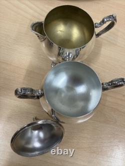 Ensemble de service à café/thé en argent clair de collection Oneida (USA) avec plateau, pot, bol et cruche.