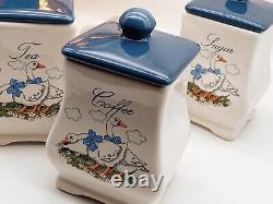 Ensemble vintage en céramique de porte-thé, café, sucre et serviettes avec un motif de canard.