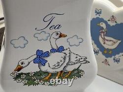 Ensemble vintage en céramique de porte-thé, café, sucre et serviettes avec un motif de canard.