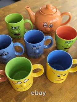 Les mugs à visage drôle de Trade Winds - Ensemble de 10 mugs rétro vintage et théière