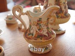 Service à café vintage Capodimonte Serpent/Cherub