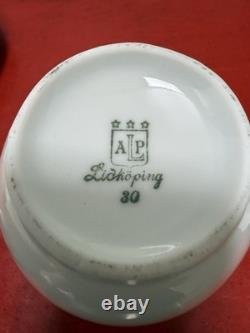 Service à café vintage en porcelaine ALP Lidköping Suède noir et or 18 pièces avec scène de château