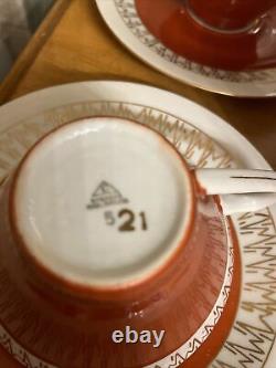 Service à thé en porcelaine de Chodziez Pologne, comprenant une théière, une crémier, un sucrier et 4 tasses vintage.
