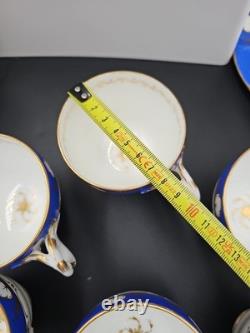 Service à thé et à café en porcelaine vintage de 23 pièces, bleu cobalt et dorure à l'or, tasses, soucoupes et assiettes.