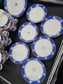 Service à thé et à café en porcelaine vintage de 23 pièces, bleu cobalt et dorure à l'or, tasses, soucoupes et assiettes.