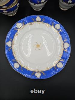 Service à thé et à café en porcelaine vintage de 23 pièces, bleu cobalt et dorure à l'or, tasses, soucoupes et assiettes.