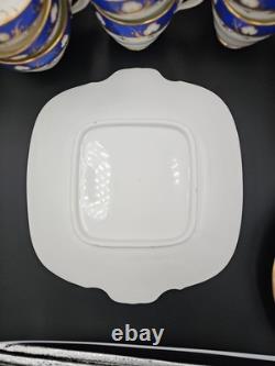 Service à thé et à café en porcelaine vintage de 23 pièces, bleu cobalt et dorure à l'or, tasses, soucoupes et assiettes.