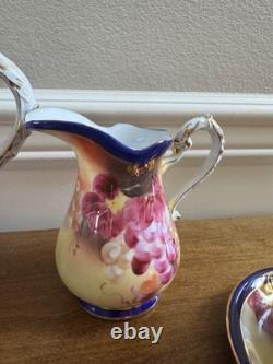 Service à thé et café vintage 17 pièces en porcelaine de Limoges bleu cobalt et or avec raisins, reproduction